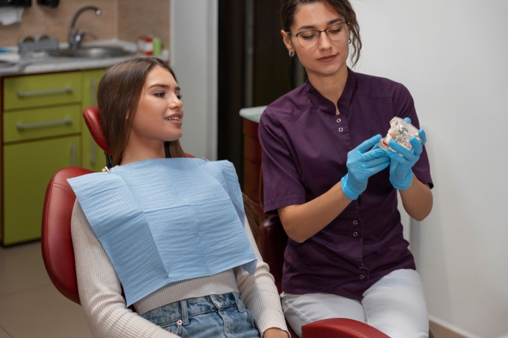 close up dentist using instruments